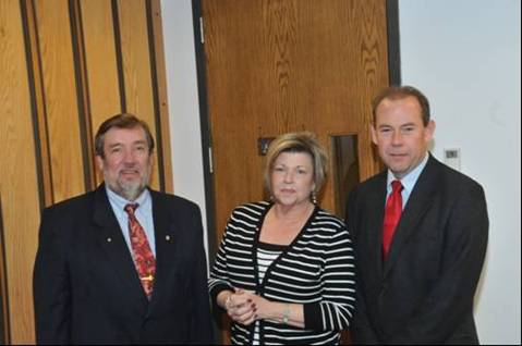 Dr. Hipel with Dr. John Sutherland (right) and Karen White (center).