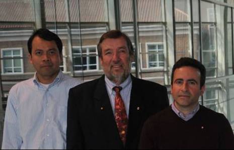 Dr. Hipel with Dr. Dan DeLaurentis (right) and Dr. Datu Agusdinata (left) of the SoSL.